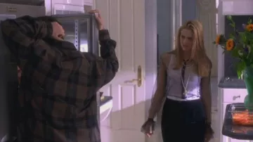 Black mesh button top worn by Cher (Ali­cia Sil­ver­stone) as seen in Clueless