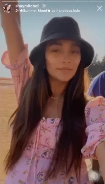 Faithfull The Brand Pink floral dress worn by Shay Mitchell on her Instagram Story