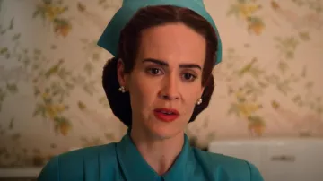 Triple pearl earrings worn by Nurse Mildred Ratched (Sarah Paulson) in Ratched TV show (Season 1 Episode 1)