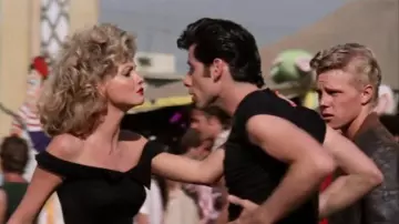 The black top naked shoulders worn by Sandy (Olivia Newton-John) in the movie Grease