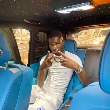 Le short Corteiz « Rules the world » porté par Dave sur son compte Instagram @santandave
