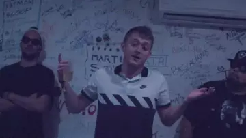 The Nike polo shirt worn by Vald in her video clip Trophy