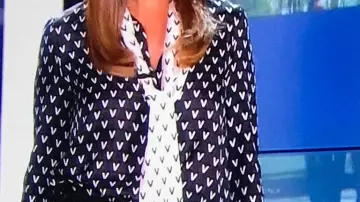 Black and white shirt with long tie has pattern worn by karine ferri Karine Ferri in the show Les docs du week end