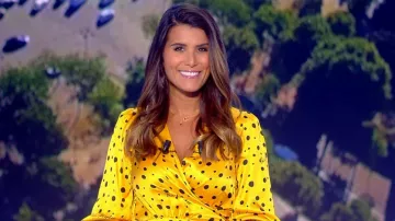 The wrap dress yellow with polka dots of Karine Ferri in the Loto draw