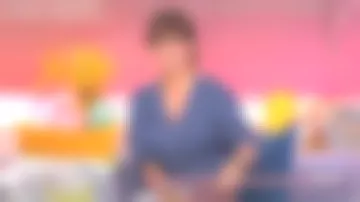 The top prussian green, v-neck and 3/4 sleeves of Faustine Bollaert in It starts today the 24.09.2020