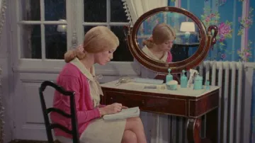 Pink Cardigan of Geneviève Emery (Catherine Deneuve) in The Umbrellas of Cherbourg