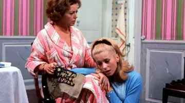 Blue Cardigan of Geneviève Emery (Catherine Deneuve) in The Umbrellas of Cherbourg