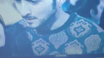 Black/gold jumper worn by Frenchie Tomer Kapon in The Boys