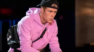 Pink Champion hoodie with patch on hood worn by Alex (Owen Joyner) in Julie and the Phantoms (S01E01)