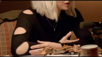Black Cutout top. Has cutouts on only one sleeve. of Olivia Moore (Rose McIver) in iZombie (S01E06)