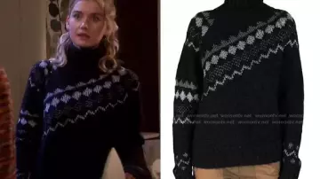 Pull de Noël noir et blanc (Claire Brady) dans Des jours et des vies (S01E01)