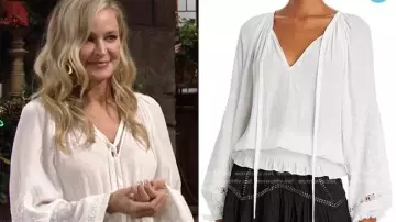 Top blanc avec lacets et manches bouffantes de Sharon Collins (Sharon Case) dans Les feux de l'amour (S01E01)