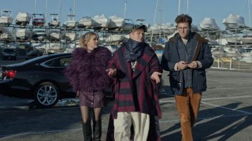 Ostrich feather jacket of Portia Davenport (Meredith Hagner) in Search Party (S04E05)