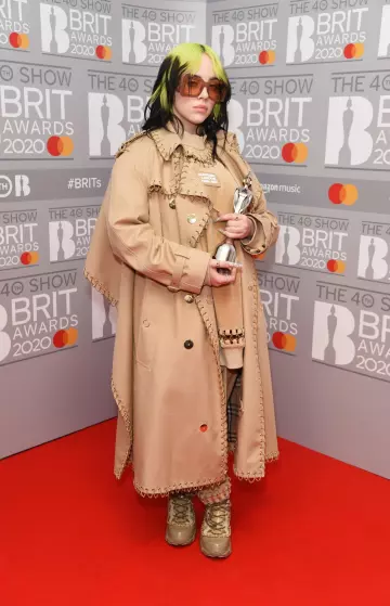 Burberry Gabardine coat in camel worn by Billie Eilish for Brit Awards 2020