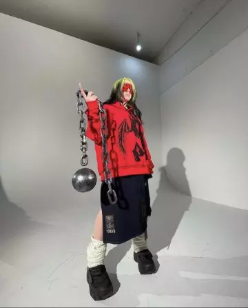 Black denim skirt worn by Billie Eilish on the Instagram account of @blohsh