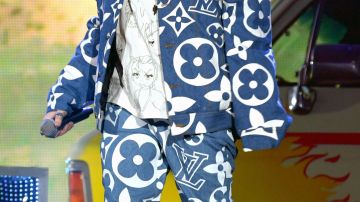 Louis Vuitton Monogram Jacket and pants blue set worn by Billie Eilish for the 2019 Coachella Valley Music And Arts Festival on April 14, 2019 in Indio, California