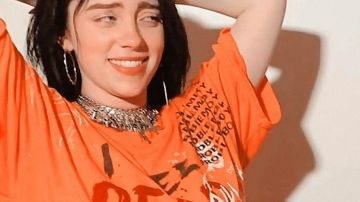 Problem6oy 'I See Dead People' Orange t-shirt worn by Billie Eilish on Billie Eilish: The World's a Little Blurry 