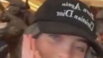 Chinatown Market “Born Again Christian Dior” Hat Cap worn by Billie Eilish in Billie Eilish Talks Baking & Performs 'you should see me in a crown' Live @ SXSW | Uber Eats YouTube video