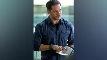 The blue shirt worn by Eddie Brock (Tom Hardy) in the movie Venom