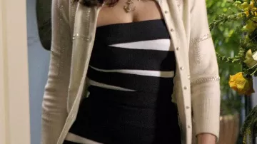 The navy blue and white Hervé Léger strapless dress worn by Blair Waldorf (Leighton Meester) in the series Gossip Girl (Season 2 Episode 19)