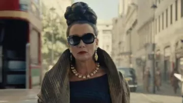 Golden coat worn by Baroness (Emma Thompson) as seen in Cruella movie