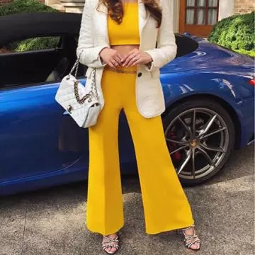 Les chaussures à talons portées par Elizabeth Gillies sur le tournage de Dynasty saison 2 sur son compte Instagram