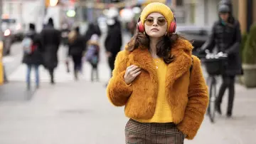 Free People Yellow beanie worn by Mabel (Selena Gomez) as seen in Only Murders in the Building (Season 1) TV series