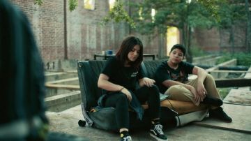 Vans high top sneakers in black worn by Elora Danan (Kawennáhere Devery Jacobs) in Reservation Dogs TV series (S01E01)
