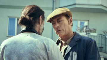 The tweed cap worn by Richard Brumére (Jean-Claude Van Damme) in the film The Last Mercenary