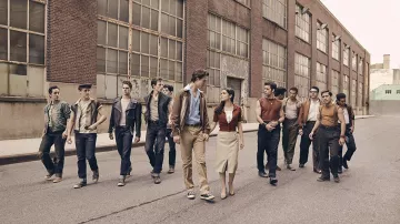 Converse Chuck Taylor All Star Low Top Navy Sneakers worn by Tony (Ansel Elgort) as seen in West Side Story