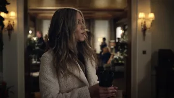 White faux fur coat worn by Alex Levy (Jennifer Aniston) as seen in The Morning Show wardrobe (S02E01)