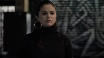 Turtleneck knit top in black worn by Mabel Mora (Selena Gomez) as seen in Only Murders in the Building (Season 1 Episode 5)