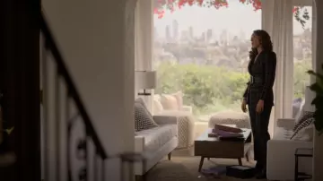 Alexander McQueen check-pattern tailored trousers worn by Bette Porter (Jennifer Beals) as seen in The L Word: Generation Q (S02E03)