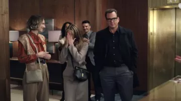 Celine besace bag worn by Alex Levy (Jennifer Aniston) as seen in The Morning Show TV series (Season 2)