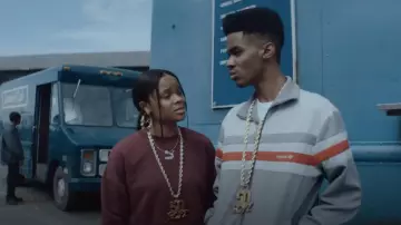 Puma Classics bell sleeve sweatshirt in burgundy worn by Kato (Ajiona Alexus) as seen in BMF Black Mafia Family outfits (Season 1 Episode 3)