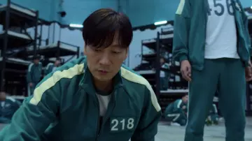 218 track suit jumpsuit worn by Cho Sang-woo (Park Hae Soo) as seen in Squid Game TV series wardrobe (Season 1 Episode 4)