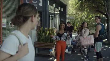 Alo Yoga High Waist Graphic Trinity Leggings in orange worn by Sherry (Shalita Grant) as seen in You TV show outfits (S03E01)