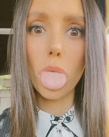 The printed blouse Alice + Olivia worn by Nina Dobrev on her account Instagram of @nina