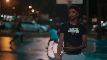 Nike 'I AM THE ANSWER' black t-shirt worn by Jace (Isaiah R. Hill) as seen in Swagger Tv series outfits (Season 1 Episode 2)