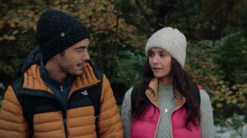 The North Face puff jacket worn by Tag (Darren Barnet) as seen in Love Hard movie