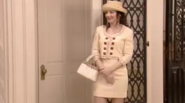 Moschino skirt suit with heart shaped buttons worn by Fran Fine (Fran Drescher) as seen in The Nanny TV show wardrobe (Season 6 Episode 22)