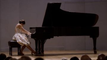 Loeffler Randall Camellia open-toe sandals worn by Lily Goldenblatt (Cathy Ang) as seen in And Just Like That… TV show wardrobe (S01E01)