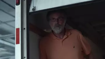 Nautica polo shirt in coral orange worn by Marty Markowitz (Will Ferrell) in The Shrink Next Door (S01E07)