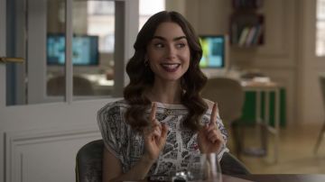 The Agnès b. "rue du jour" worn by Emily Cooper (Lily Collins) in Emily in Paris (Season 2 Episode 10)