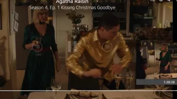 Green Sleeve Sequin dress worn by Agatha Raisin (Ashley Jensen) in Agatha Raisin TV series outfits (Season 4 Episode 1)