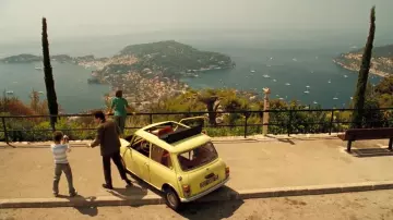 Mini Cooper Yellow Convertible car driven by Mr. Bean (Rowan Atkinson) as seen in Mr. Bean's Holiday
