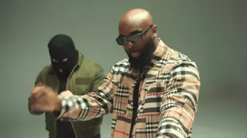 The Burberry plaid shirt jacket worn by Kaaris in her video clip Shooter with Kalash Criminal