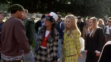 Forever 21 White Feather backpack worn by Cher (Alicia Silverstone) in Clueless movie wardrobe