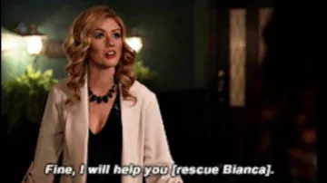 The velvet dress worn by Mia Smoak (Katherine McNamara) in the series Arrow (Season 8 Episode 9)