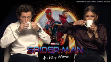 The Reiss zipped white polo shirt worn by Tom Holland during a press junket for Spider-Man: No Way Home